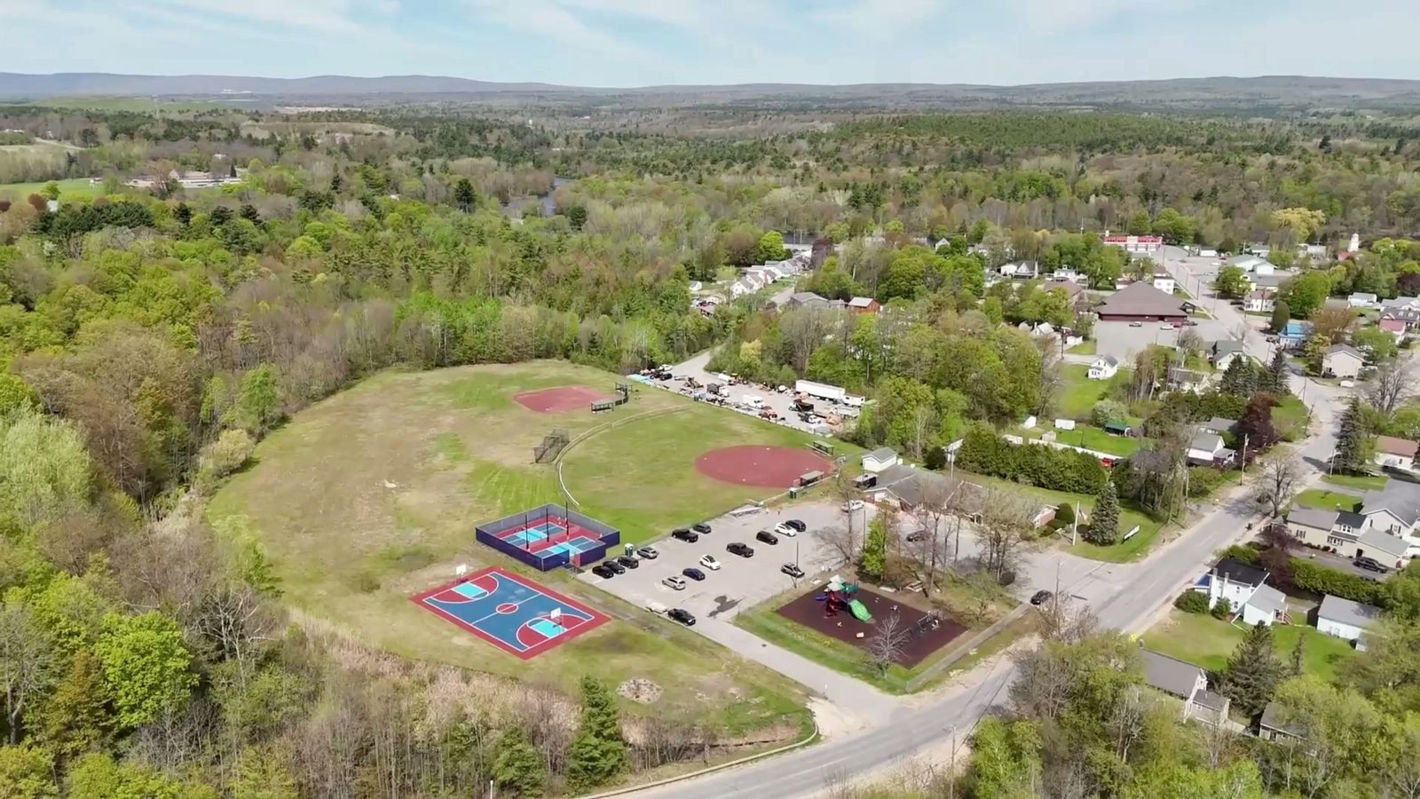 Aerial view of Schuyler Falls from the town welcome film